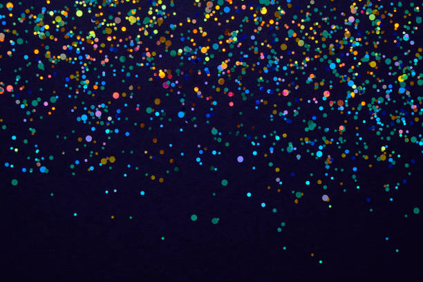 istock Glitter background. Christmas texture for your design and text. Multicolored sweets on a dark background 1133987412