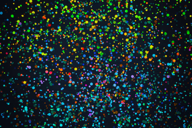 istock Glitter background. Christmas texture for your design and text. Multicolored sweets on a dark background 1133987438