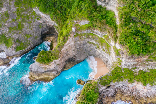istock Blue ocean and cliffs. Bali shores from above. Aerial drone shot. 1133990877