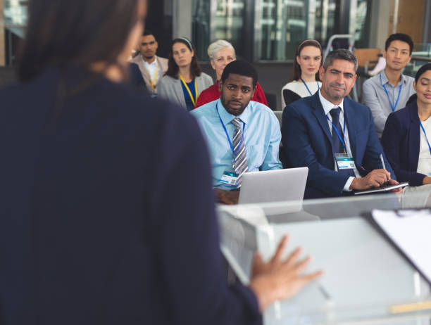 istock Group of business people attending a seminar 1133991330