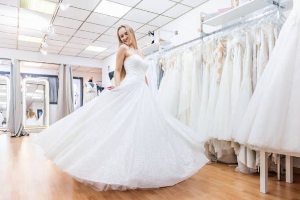 istock Playful bride in bridal shop 1133992305