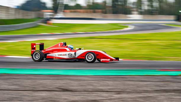 istock Man driving formula racing car 1133992318