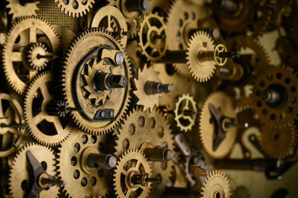 istock Gears and cogs in old vintage mechanism 1133992941