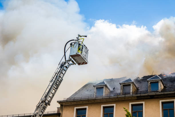 istock Fire extinguishing with a turntable ladder Fire brigade 1133995256