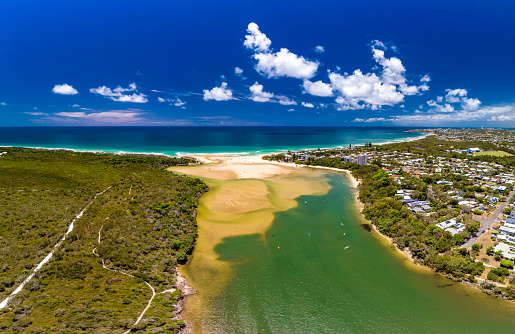 Aerial drone view of beach and Currimundi Lake, Caloundra, Sunshine Coast, Queensland, Australia