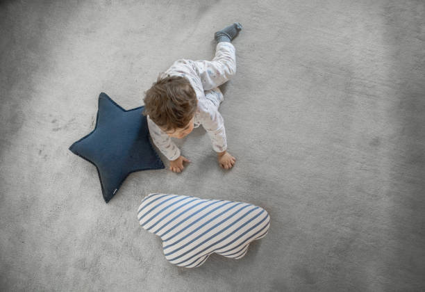 istock Kids playing at home with a tent 1133999305