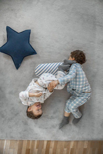 istock Kids playing at home with a tent 1133999329
