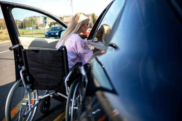 istock Physically challenged person trying to enter her vehicle 1133999376