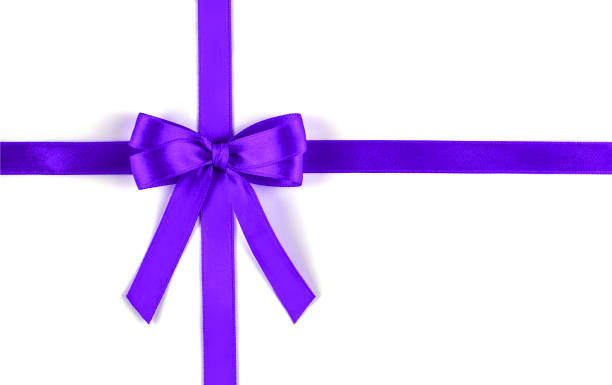 istock Shiny purple silk ribbon on white background. 1134000729