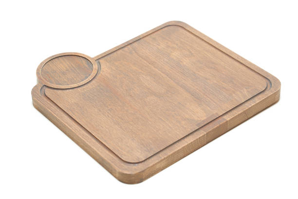 istock handmade cutting board, unusual shape, made of wood on a white background 1134000736