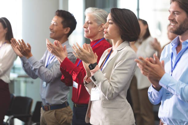istock Business people applauding in a business seminar 1134000856