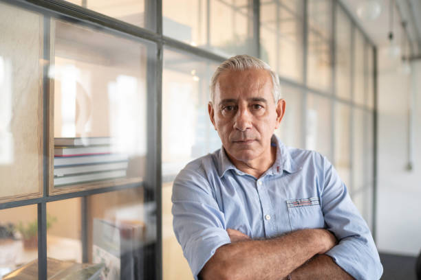 istock Senior businessman portrait at work 1134001528