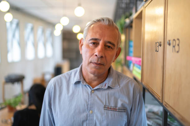 istock Senior businessman portrait at startup modern office 1134001645