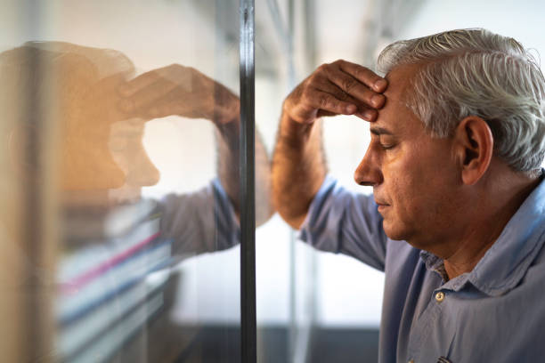 istock Frustrated senior businessman with headache at work 1134001718