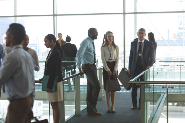 istock Business executives interacting with each other in office 1134001862