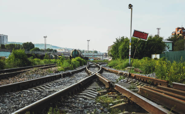 istock Two railways tracks merge close up. 1134002163