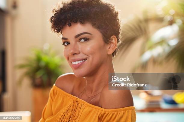 Smiling Young African Woman Stock Photo - Download Image Now - Women, One Woman Only, Short Hair