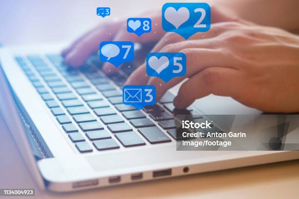 Man Is Using Laptop With Black Keys Social Media And Social Networking Marketing Concept Stock Photo - Download Image Now