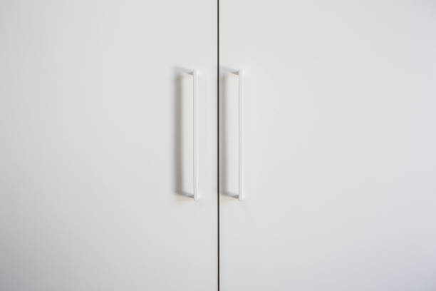 White closet doors wood closeup, modern design background texture