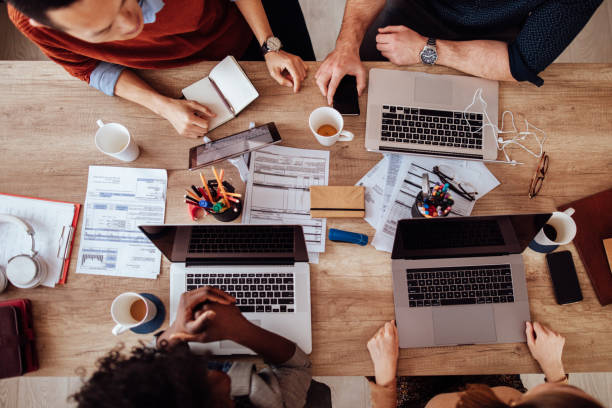 istock Overhead view of business meeting 1134005572