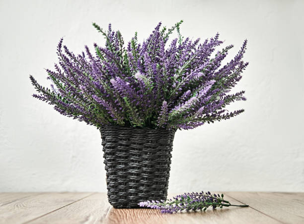 istock Bunch of lavander on wooden background. Spring concept 1134005608
