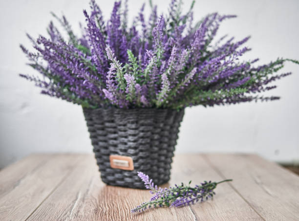 istock Bunch of lavander on wooden background. Spring concept 1134005613