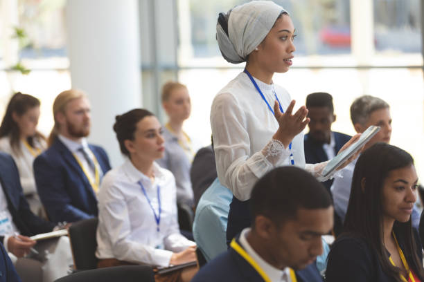 istock Young businesswoman asking question during seminar 1134006735