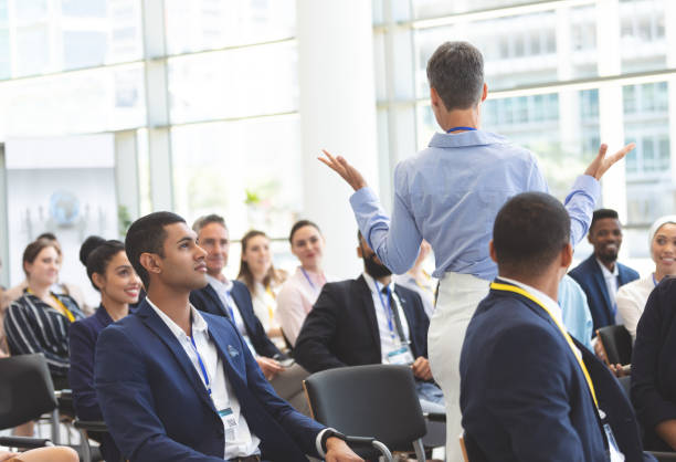 istock Businesswoman asking question during seminar 1134007113