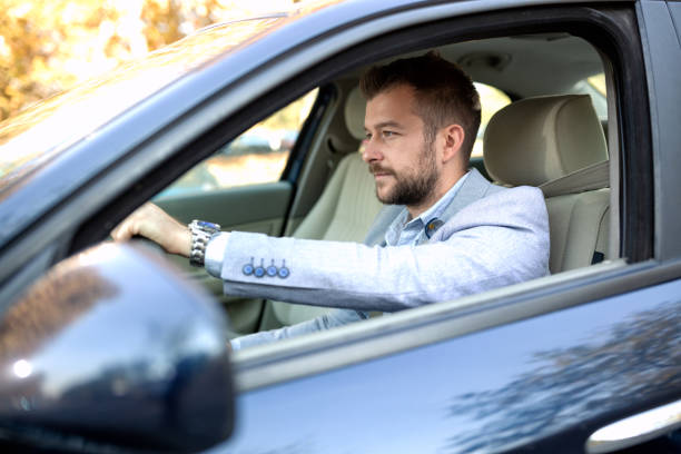 istock Young bearded guy in fancy gray suit 1134007144