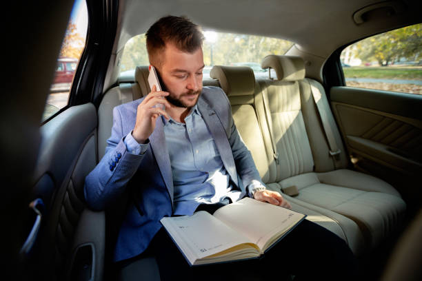 istock Arranging business details from the car 1134007260