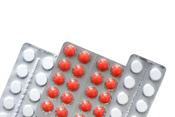 istock Packages with pills and tablets on white background close up 1134007267