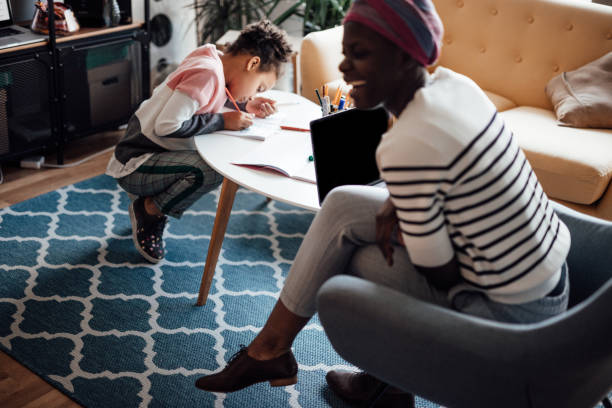 istock Mother Helps Daughter With Homework 1134007360