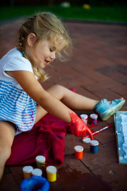 istock Girl is painting 1134007945