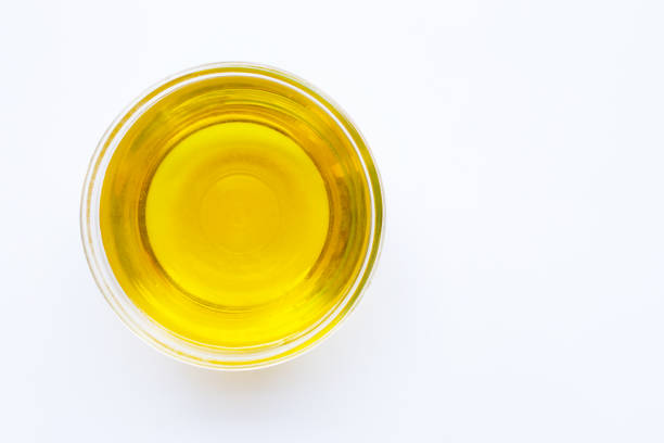 istock Olive oil bowl isolated on white. Top view 1134008618