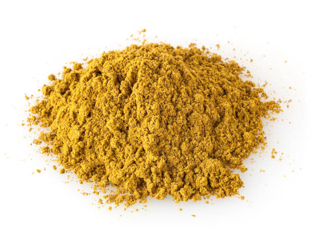 istock Heap of curry powder isolated on white background 1134012220