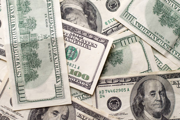 istock Texture US dollars. Background of one hundred dollar bills. 1134015034