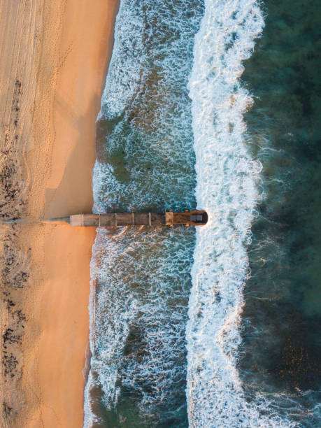 istock Stormwater pipe on the coastline 1134016057