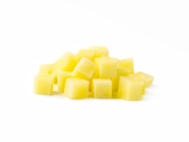 istock Heap of diced raw potatoes isolated on white background 1134020012