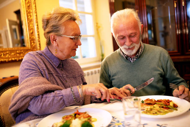 istock Older folks having a healthy meal 1134024412