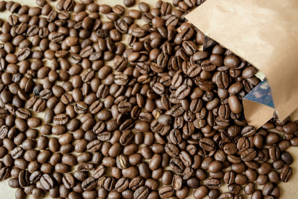 istock Roasted coffee beans on wooden table 1134026406