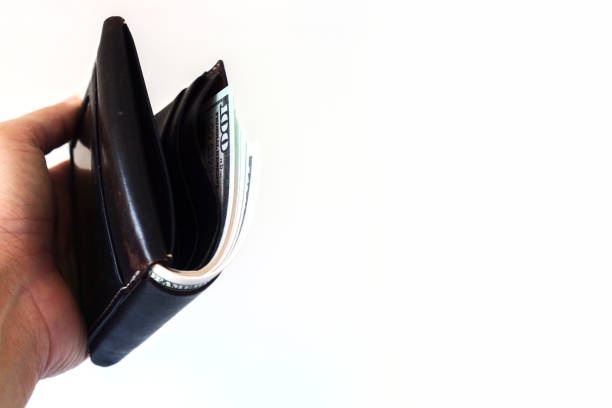istock A black purse with us dollars with clipping path 1134030197