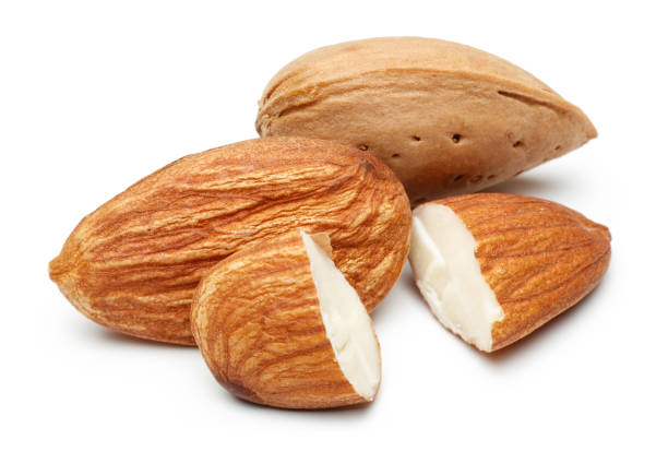 istock Group of almonds isolated on white 1134030375