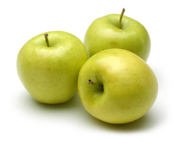 istock Whole golden apples isolated on white 1134032023