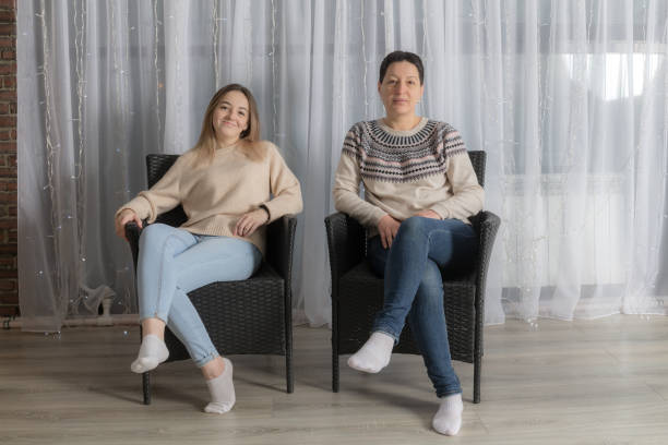 istock mom and daughter in chairs 1134032837