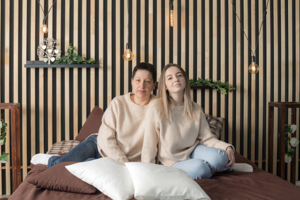 istock mom with her daughter on the bed 1134032843