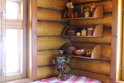 The interior of a log house.