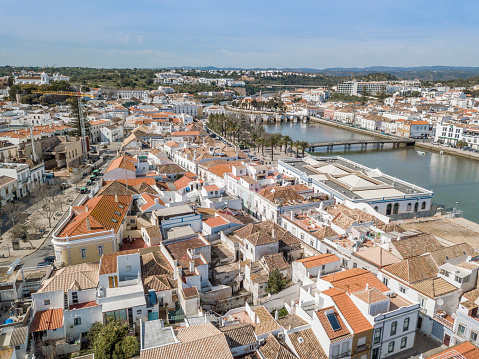 Aerial view of charming Tavira with roman bridge in sunny day, Algarve, Portugal
