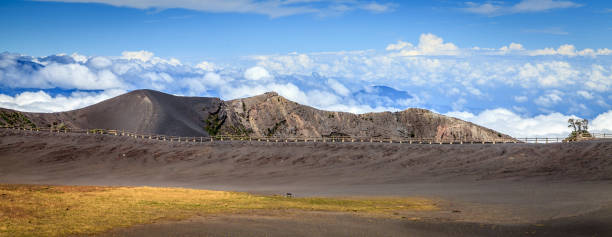 Top of Irazu volcano in Costa Rica Ash field and hiking trail on top of Irazu volcano in Costa Rica irazu stock pictures, royalty-free photos & images