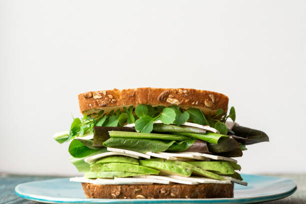 istock Vegetarian sandwich with avocado and microgreen 1134034898