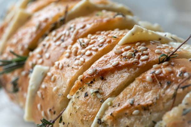 istock Baguette with butter, garlic and rosemary 1134034977